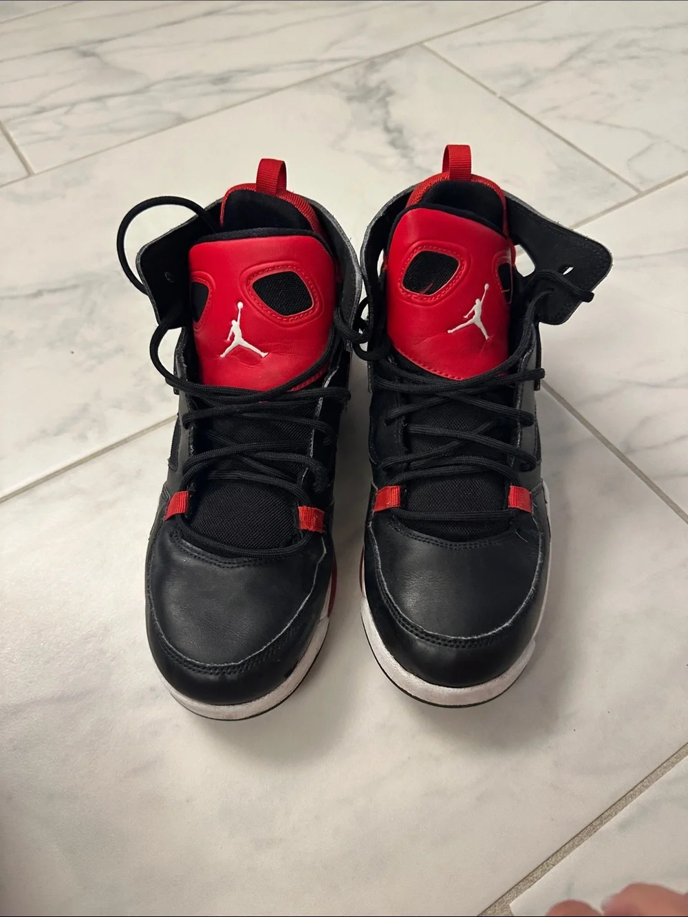 Jordan youth size 6y Black and Red High-Top Sneakers